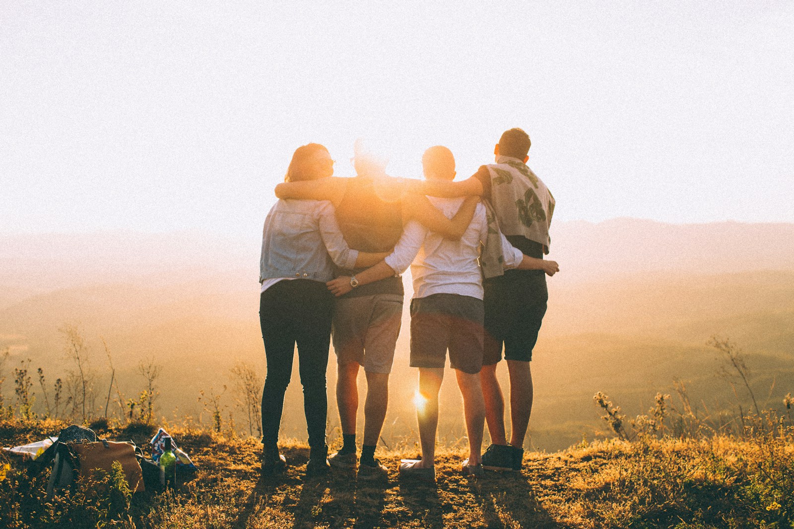 A family enjoying a warm sunset together